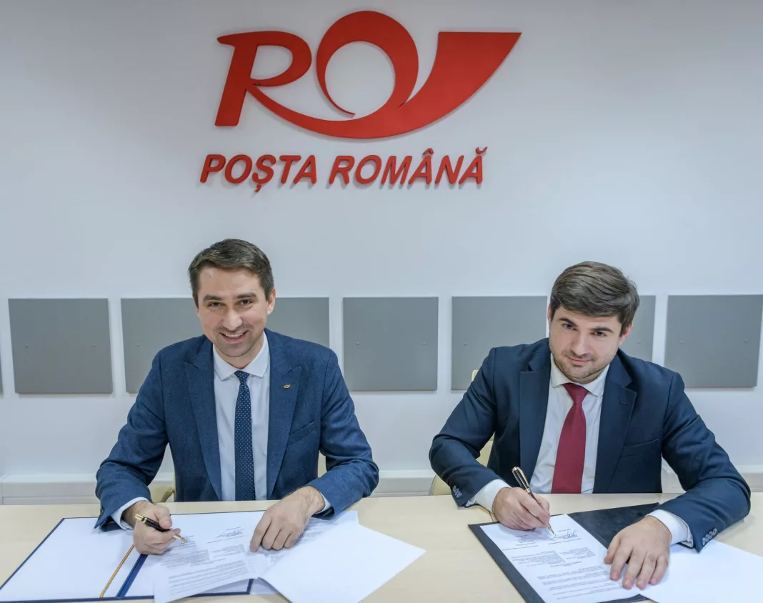 Valentin Ștefan, directorul general al Companiei Naționale Poșta Română și Roman Cojuhari, omologul din Republica Moldova